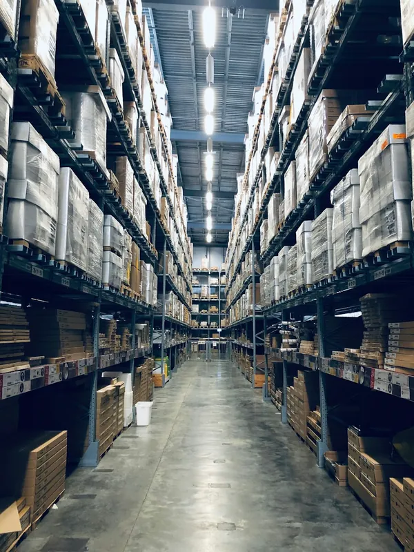 Racked warehouse aisle at the Space Shipping facility